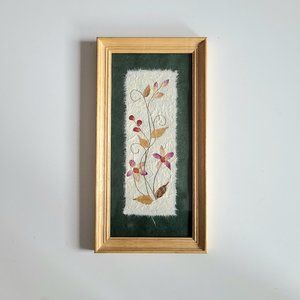 Framed pressed dry flowers.